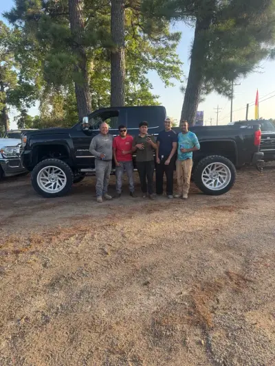 Happy GreenLight buyer with their vehicle