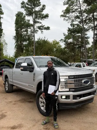 Happy GreenLight buyer with their vehicle