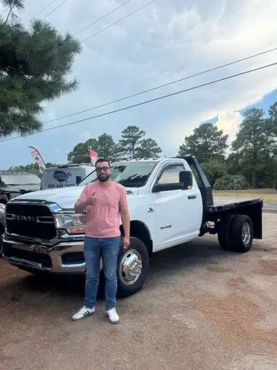 Happy GreenLight buyer with their vehicle