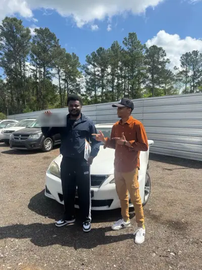 Happy GreenLight buyer with their vehicle